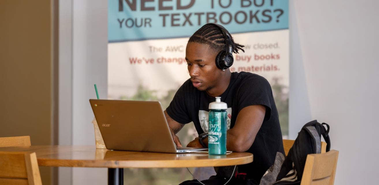 A student using their laptop